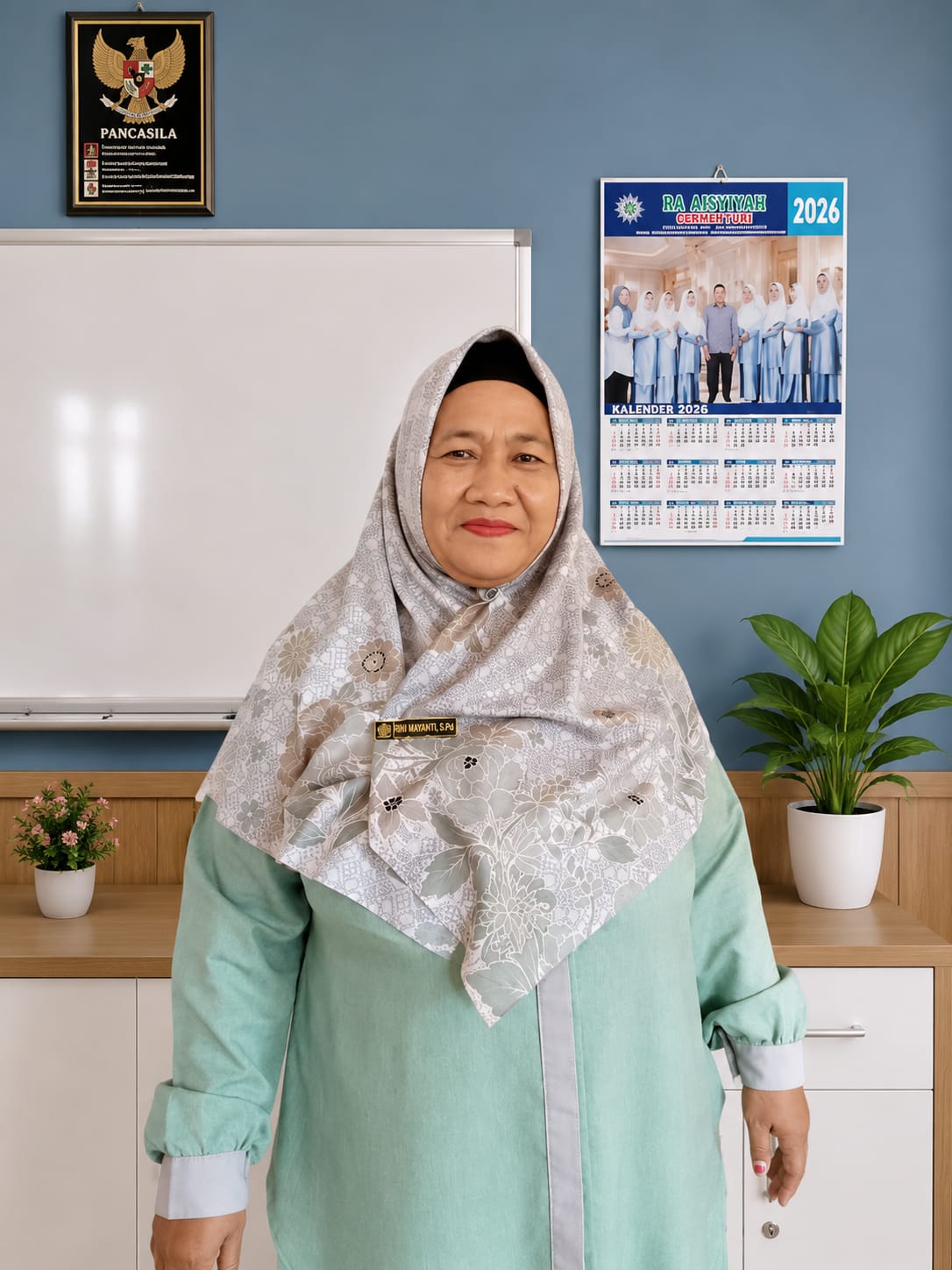 Rini Mayanti, S.Pd
